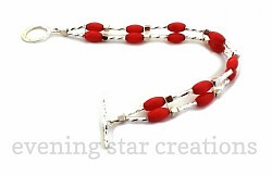 Red Coral and Silver 2-Strand Bracelet with Sparkling Silver-Plated Toggle Clasp.    For more details, close this window and click on 