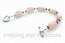  Chunky Rose Quartz Bracelet with Silver-Plated Heart Toggle Clasp. For more details, close this window and click on 